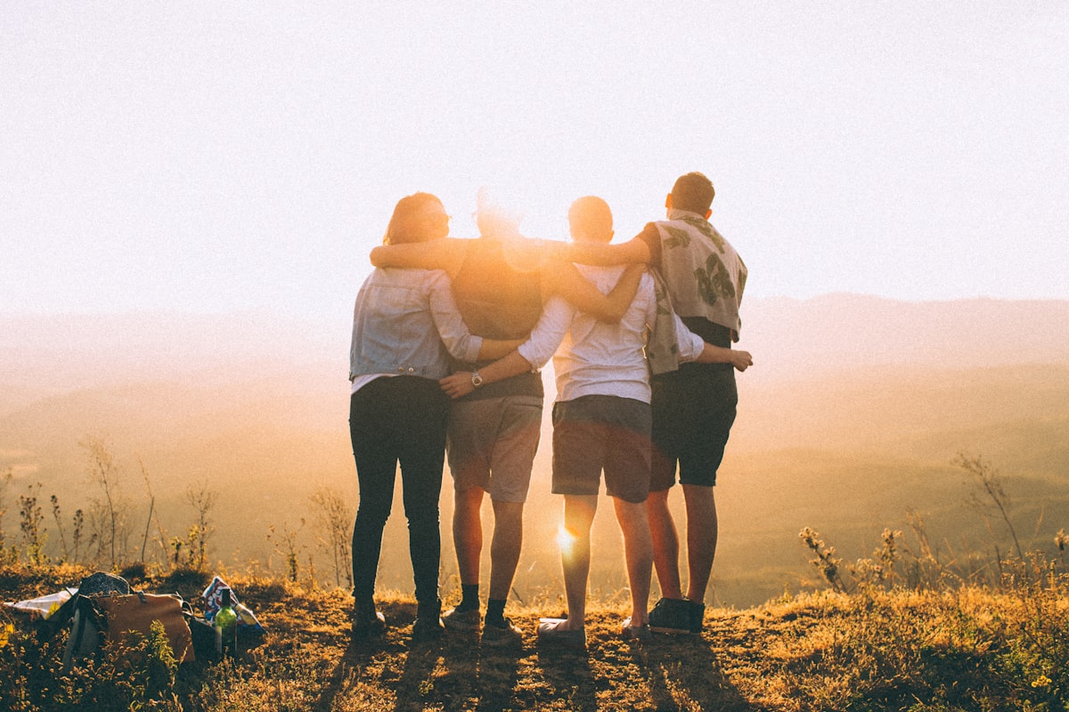 Social gathering around a table — stock ambiance, not actual residents